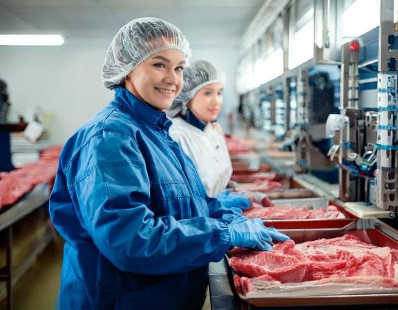 Firefly female workers are processing frozen meat in factory 40455-Putino-Food