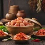Hình ảnh gia công củ kiệu (dưa món)
